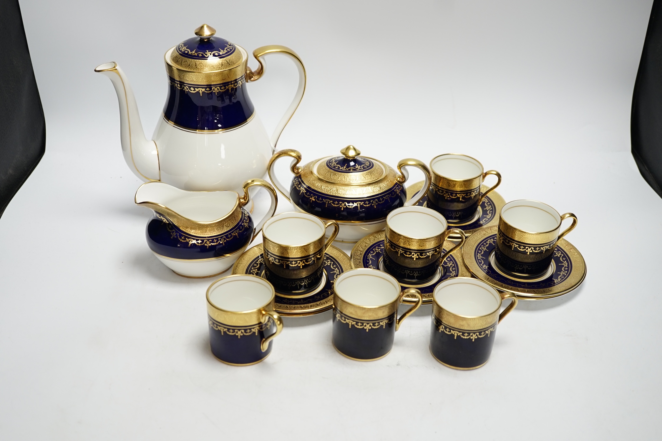 An Aynsley 'Georgian Cobalt' eight place setting coffee service (one coffee cup missing)